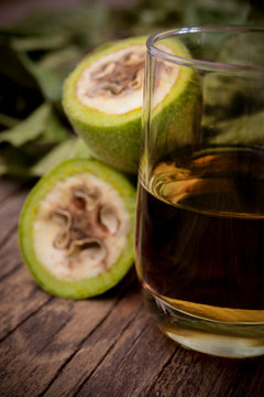 nocino liqueur made with unripe green nuts and alcohol