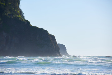 Fototapeta na wymiar Waves strike a headland near Cape Meares, Tillamook County, Oregon
