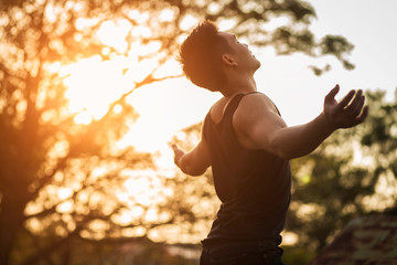 practicing meditation in the midst of natural sunlight.