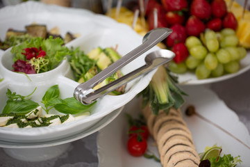 Beautifully decorated table, covered with different cuts.