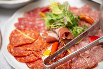 sliced salami on the plate