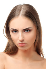 Fototapeta premium A teenage girl is offended looking in front of her