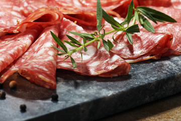 thinly sliced salami . delicious snack rustic salami