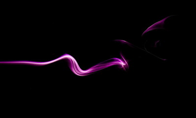 Purple smoke on black background