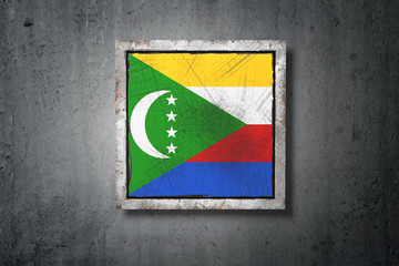 Union of the Comoros flag in concrete wall