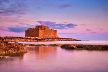 Pafos Harbour Castle in Pathos, Cyprus, on a sunset