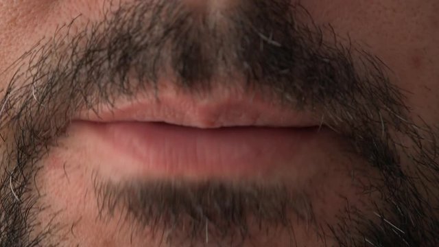 Close up of man's mouth speaking