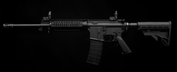 Gun rifle isolated on black