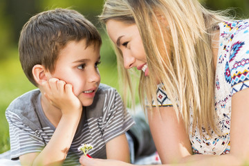 Mother and son in park outdoors