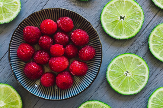 Red Raspberries and Sliced Limes