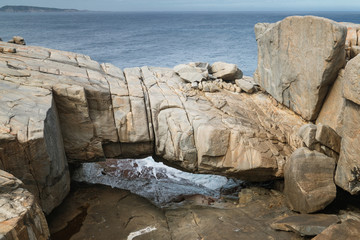 Natural bridge within the amazing Torndirrup National Park close to Albany, Western Australia