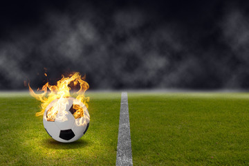 ballon de football brûlant dans le stade