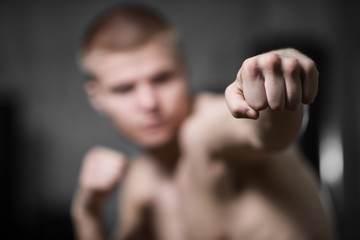boxer beats fist