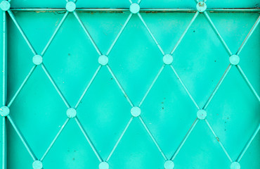 close-up shot of green old turkish pattern metal door
