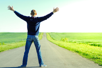 Lonely man on an empty road