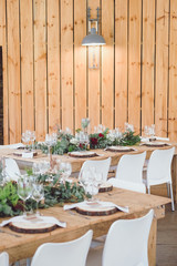 2 Wedding Tables with Wood Backdrop