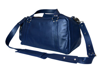 Leather traveling bag of blue color with a removable shoulder strap, it is isolated on a white...