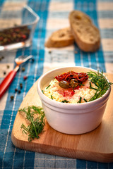 Cottage cheese with olive and dried tomato