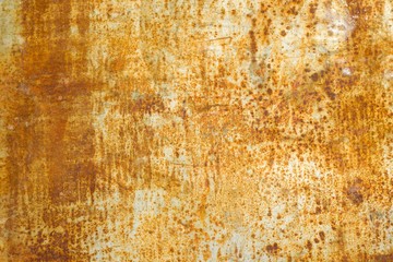 Abstract corroded rusty metal background, texture, yellow brown.