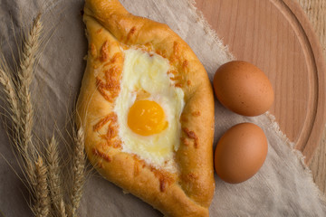 Khachapuri traditional Georgian cheese and egg-filled bread