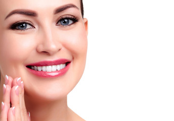 Obraz premium Pretty woman with smooth and soft skin smiling to you, isolated on white background
