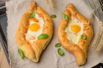 Khachapuri traditional Georgian cheese and egg-filled bread