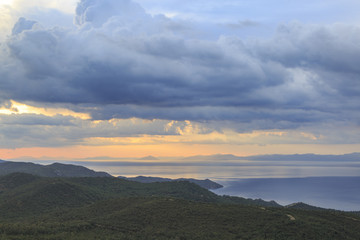 Sunset over Aegean sea from the mountains between datca and marmaris in Turkey