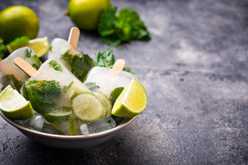 Mojito cocktail popsicle with mint, lime and rum