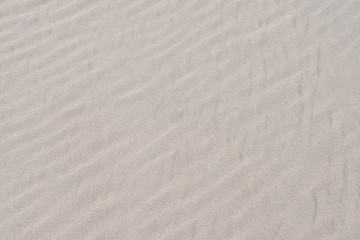 Obraz premium Interesting sand texture background, dunes, shadow play.