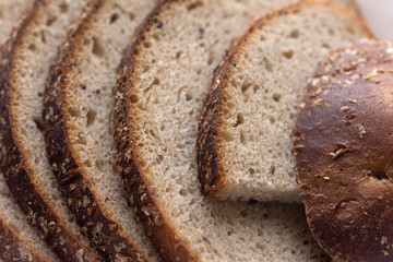 Large and thin slices of rye bread, macro shot.