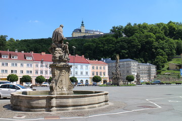 Fototapeta premium Baroque Trinity column on Komenskeho square in Fulnek, Czech republic