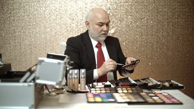 Makeup artist showing master classes for makeup
