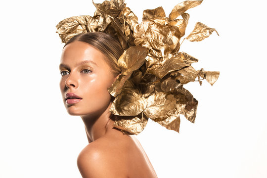 Woman with gold leaves