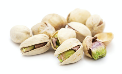 heapf of ripe roasted pistachio isolated on white background