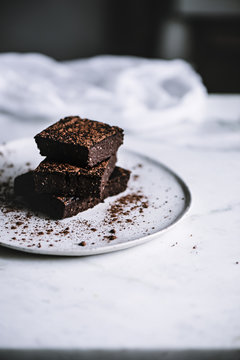 Close up of brownie pieces served on plate