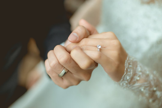 Hands of Husband and Wife with Their Wedding Rings · Free Stock Photo