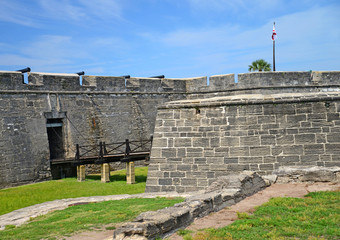 Fototapeta na wymiar Castillo de San Marcos The fort entrance stood protected by a drawbridge seen in this view 