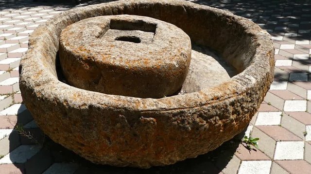 seten stone, large carved stone mill to grind flour and bulgur,
carved stone mill,

