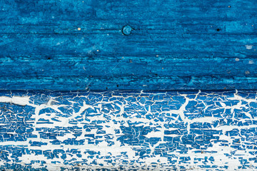 texture of an old tree with cracks, painted wooden surface with peeling paint, close-up abstract background