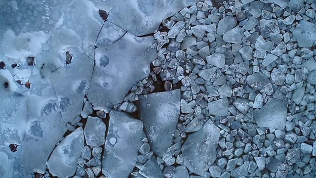 Aerial view of the frozen rocky sea on the coast of Muraste, Estonia.