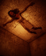 3d illustration of ghost woman crawling on the wall in haunted house