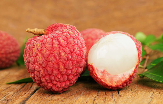 close up lychee on wood