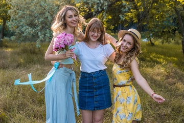 Three girls friends outdoor in the park or forest. bachelorette, party