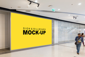Mock up blank large billboard and blurred passer