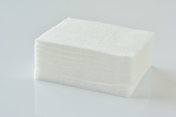 Cotton pads on a white background 



