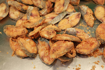 Fried dried fish sliced.