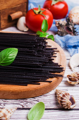 Raw black spaghetti