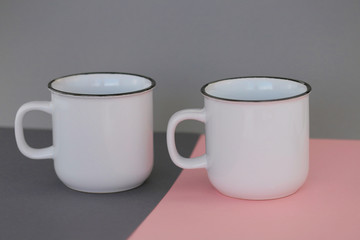tableware mockup.   white mugs on a trendy gray pink background.Minimalist cup Mockup.copy space
