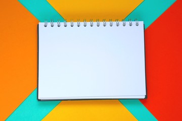 empty Blank Notepad on a  graphical geometric background. Flat lay, top view, copy space