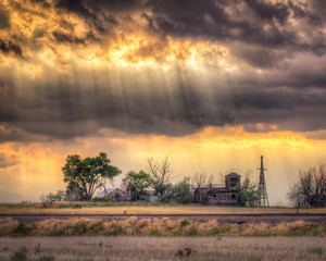 Old Farmhouse Under a Dramatic Sky